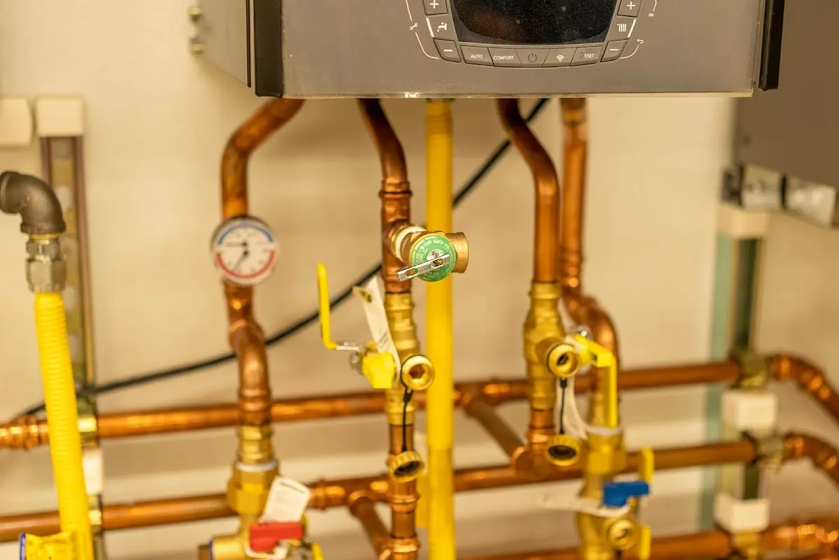 Licensed technician providing Backflow Prevention for a homeowner in Andrews